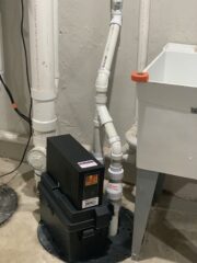 Water heater installation and repair by a professional plumber in utility room
