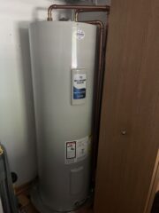 Tankless water heater installation in a modern energy-efficient home