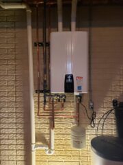 New construction plumbing installation in a newly built house