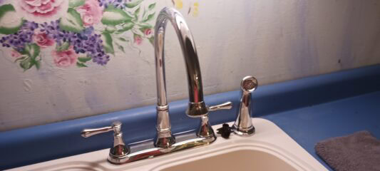 Kitchen remodeling plumbing with upgraded sink and faucet