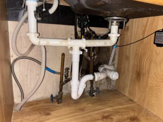Sump pump installation with battery backup for flood prevention