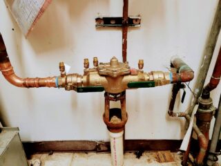 Kitchen plumbing services including garbage disposal and faucets